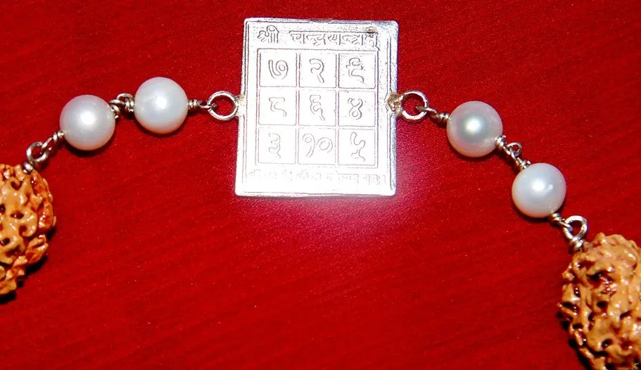 Moon (Chandra) yantra bracelet with 2 mukhi Rudrakshas and Pearl to pacify planet Moon