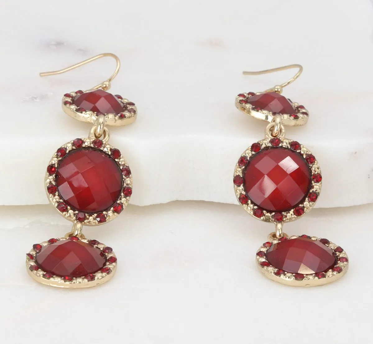 Red faceted tri-disc dangle earrings